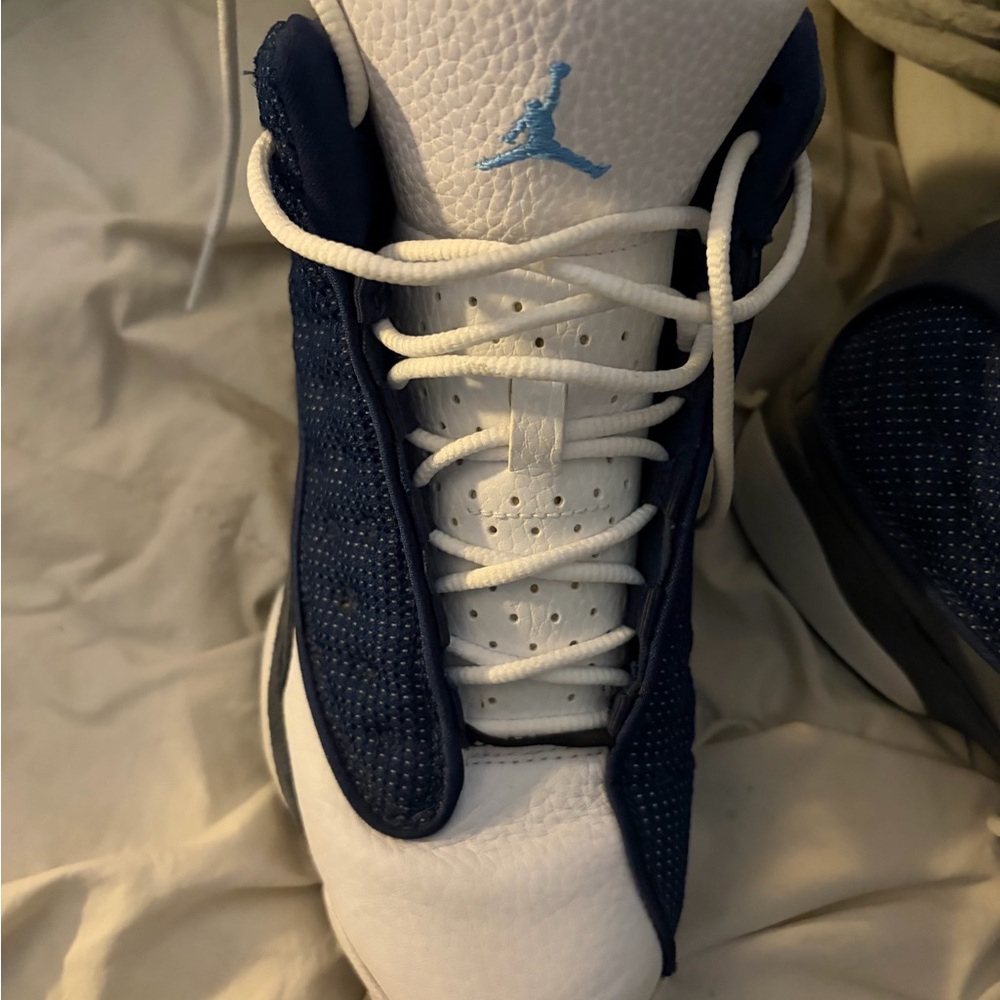 Air Jordan Retro Sneaker in White and Navy